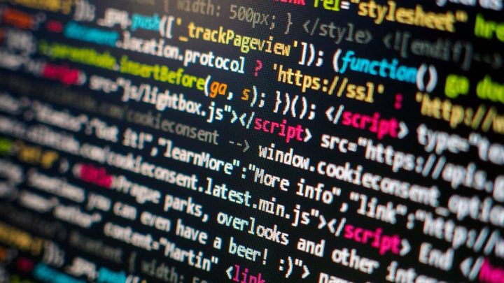 Colourful HTML and JavaScript source code on a computer screen